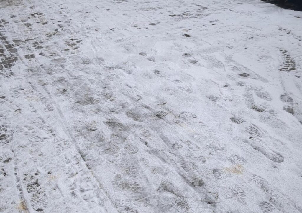 Footprints on snow on the street